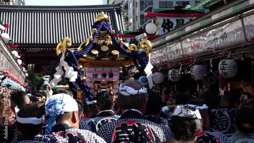 ASAKUSA, TOKYO, JAPAN - 18 MAY 2024 : Scenery of SANJA MATSURI (SANJA FESTIVAL) in Asakusa city. Japanese summer festival concept video. Slow motion shot.