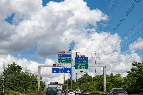 Driving on highway and road signs to Paris and other French cities, different types or roads in  France, transportation and traffic photo