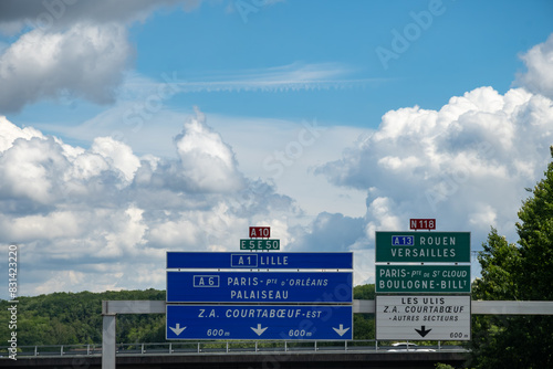 Driving on highway and road signs to Paris and other French cities, different types or roads in  France, transportation and traffic photo