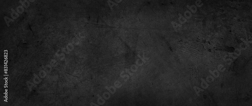 Dark grey textured concrete black wall background photo