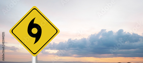 Hurricane season with symbol sign against a stormy background and copy space. dirty and angled sign adds to the drama. hurricane sign, hurricane season sing on cloudy background