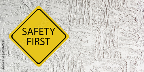 Safety first symbols, work safety, caution work hazards, danger surveillance, zero accident concept. Wooden cubes with smart grey background. Employees safety awareness at workplace. Safety banner.