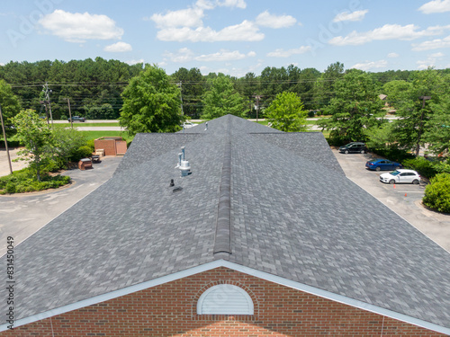 Drone Images of Commercial Roofs Featuring TPO and Asphalt Shingles: Midday, Sunny, No People photo