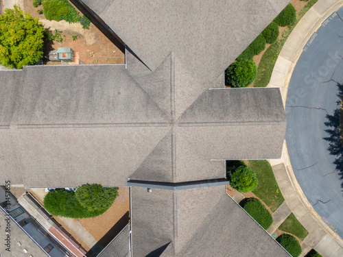 Drone Images of Commercial Roofs Featuring TPO and Asphalt Shingles: Midday, Sunny, No People photo