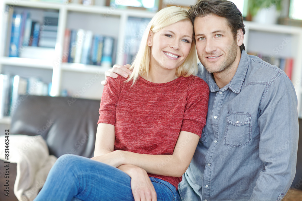 Couple, portrait and hug on sofa in home living room, bonding or relaxing and having fun. Smile, man and woman sitting on couch for embrace, happiness and enjoying security together for support Couple, portrait and hug on sofa in home living room, bonding or relaxing and having fun. Smile, man and woman sitting on couch for embrace, happiness and enjoying security together for support