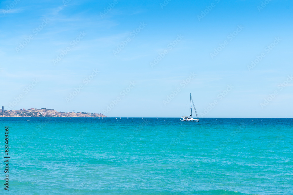 Serene Mediterranean Sea with Sailboat near Alicante
Serene Mediterranean Sea with Sailboat near Alicante