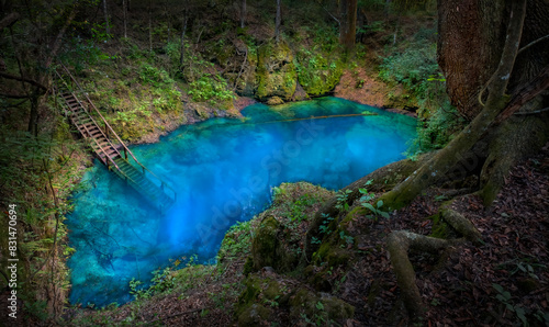 An Illuminated Private Sinkhole at Night in North America