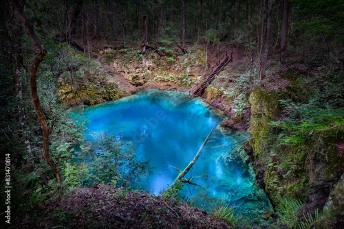 An Illuminated Private Sinkhole at Night in North America