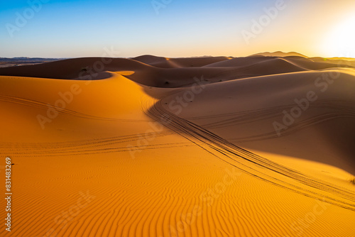 Obraz na płótnie Sand dunes at Erg Chebbi Sahara desert at sunset near Merzouga town, Morocco, North Africa w salonie