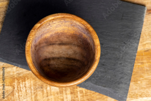 close-up of an empty old wooden bowl with a round shape