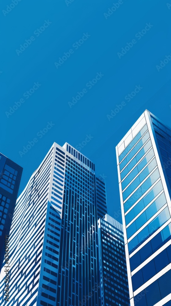 Tall urban houses, view from below, blue sky Tall urban houses, view from below, blue sky