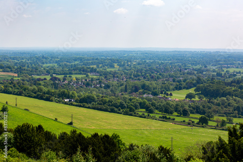 Landscape view of the English countryside on a warm spring day, Image shows a beautiful countryside view from the top of Box hill on the outskirts of London