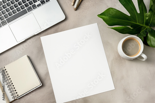 Wallpaper Mural Blank paper, laptop, coffee, plant, pens, notebook on a beige desk creating a peaceful workspace. Background with copy space. Mockup, copy space. Torontodigital.ca