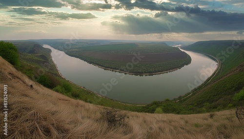 the view from the top of the great dniester river that flows through the hilly area photo