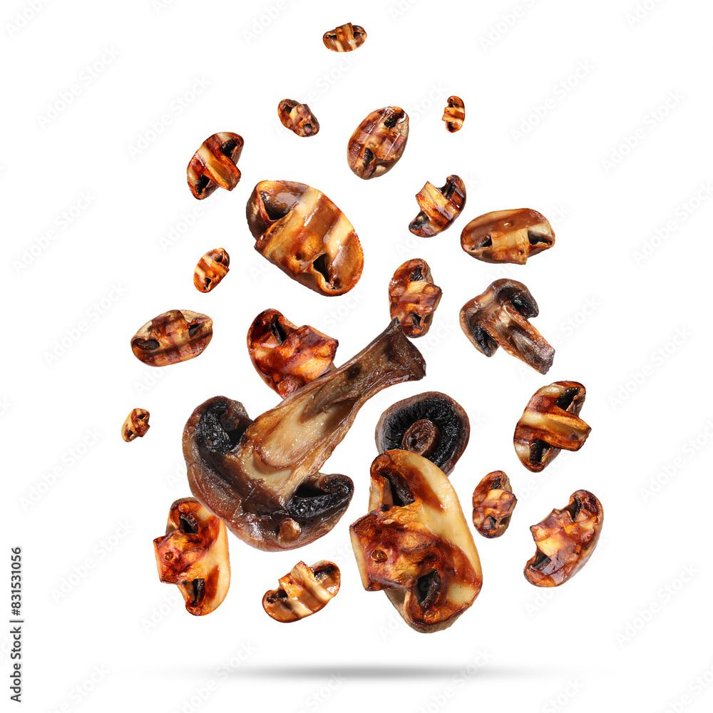 Obraz premium Slices of grilled mushrooms in air on white background