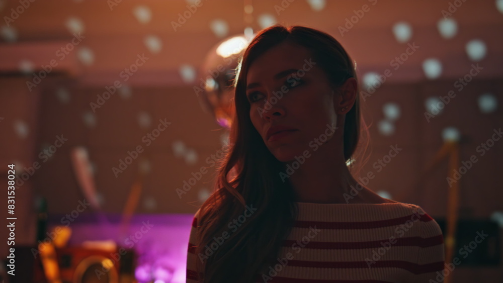 Party girl feeling loneliness staying alone after night gathering close up. Party girl feeling loneliness staying alone after night gathering close up.
