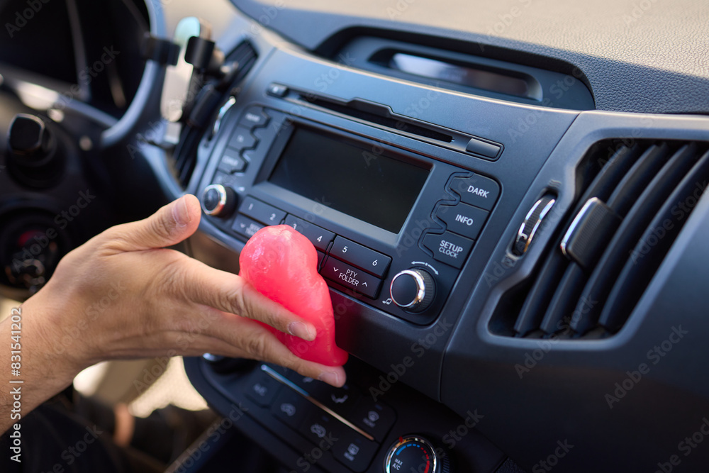 Clean car air vents efficiently with soft pink gel for innovative interior detailing Clean car air vents efficiently with soft pink gel for innovative interior detailing