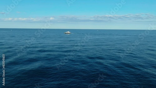 Aerial drone video. Blue Mediterranean Sea. Yacht. Breathtaking view.Cap d'Antibes