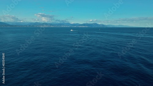 Aerial drone video. Blue Mediterranean Sea. Yacht. Breathtaking view.Cap d'Antibes