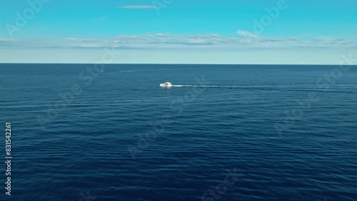 Aerial drone video. Blue Mediterranean Sea. Yacht. Breathtaking view.Cap d'Antibes