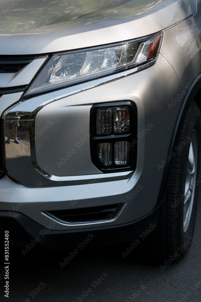 Leftist front wheel and headlight. Replicas of Russian cars. Halogen lighting at the gray car. Leftist front wheel and headlight. Replicas of Russian cars. Halogen lighting at the gray car.