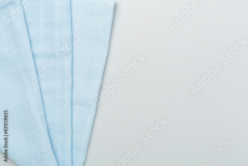 Cotton fabric on color background, top view