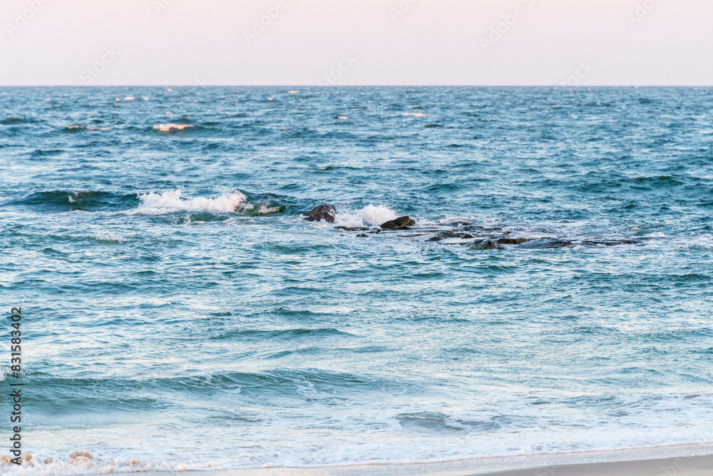 Obraz premium Avon By the Sea, New Jersey, USA - Golden hour sunrise looking at the Atlantic Ocean