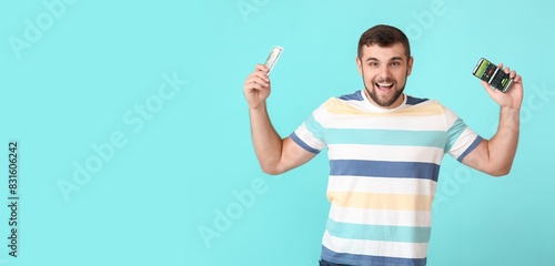 Happy young man with money ...