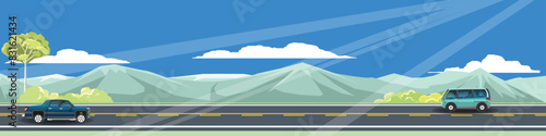 Horizontal view of asphalt road. Two cars driving on the road two lanes. Landscape view of mountain under blue sky and white clouds.