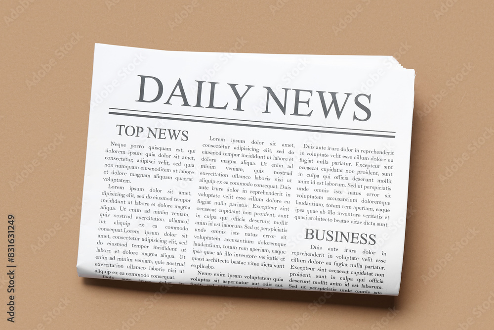 Fototapeta premium Daily newspaper on brown background