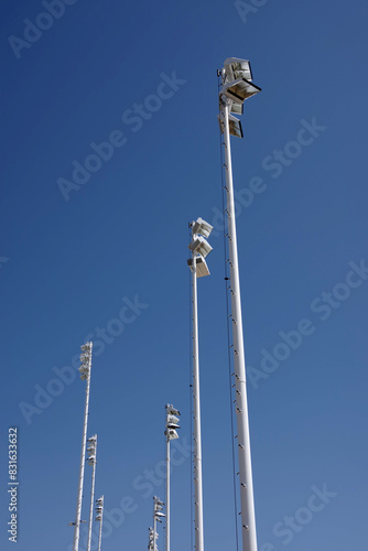 Fototapeta Tall sports stadion lighting masts