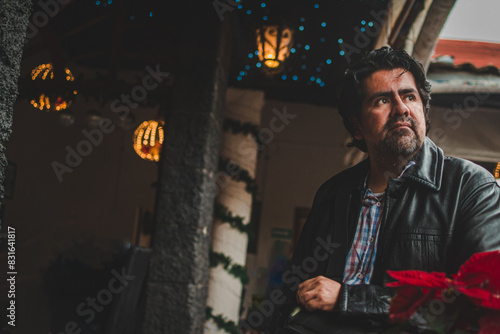 Latino man inside an old cafe in the city of Coatepec, Veracruz photo