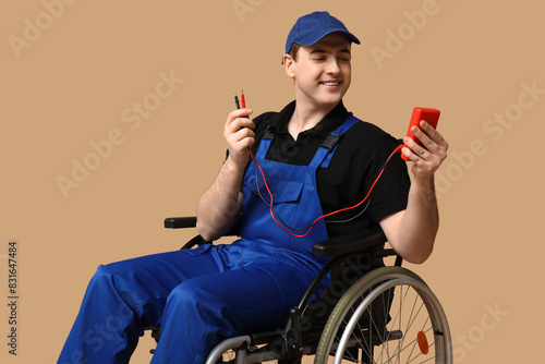 Male electrician in wheelch...