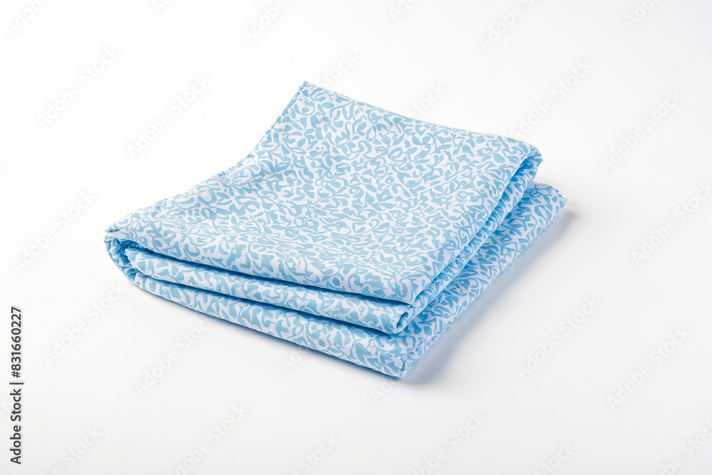 Folded Blue and White Fabric with Floral Pattern Folded Blue and White Fabric with Floral Pattern