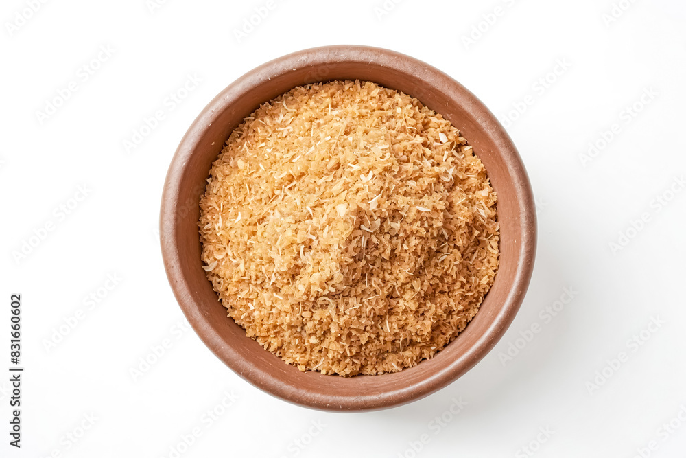 Closeup of Desiccated Coconut in a Clay Bowl Closeup of Desiccated Coconut in a Clay Bowl