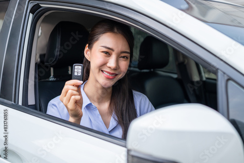 Wallpaper Mural Portrait of Asian beautiful woman driver sitting in car before driving.  Torontodigital.ca