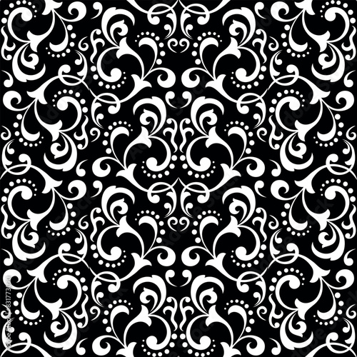 Wallpaper in the style of Baroque. Seamless vector background. White and black floral ornament. Graphic pattern for fabric, wallpaper, packaging. Ornate Damask flower ornament.
