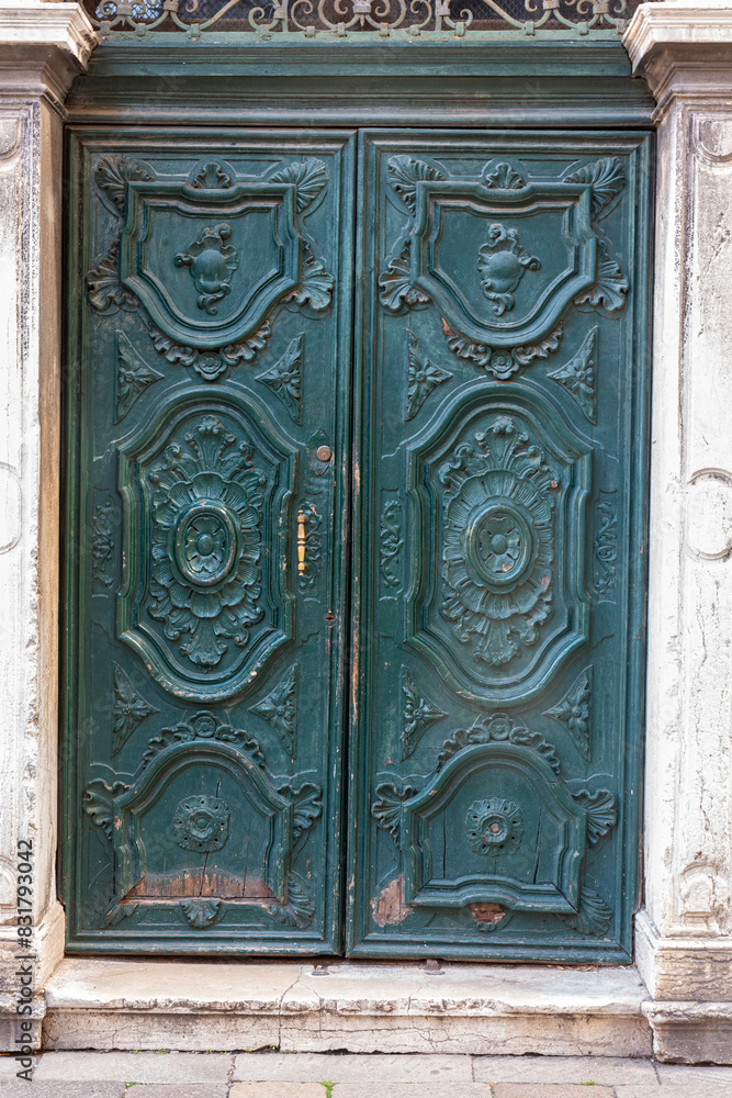 Metal door of house with ornates in jewish gheto in Venice Metal door of house with ornates in jewish gheto in Venice