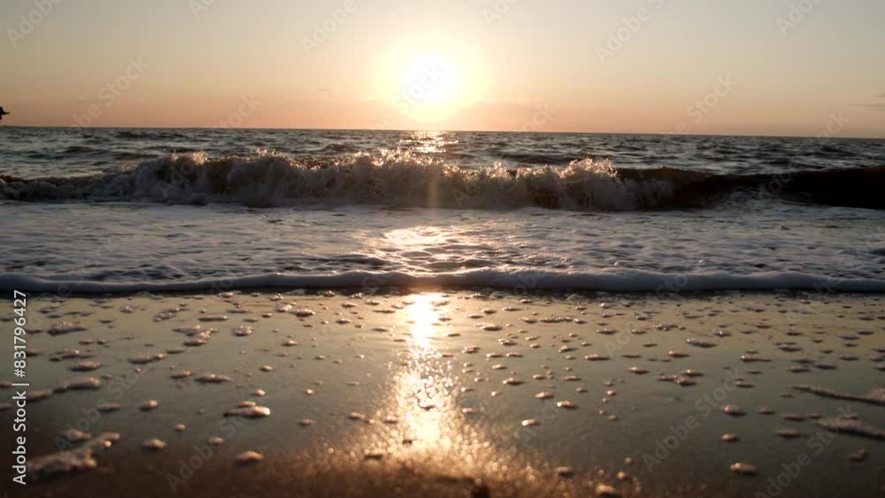 Bright Sunset Over Foaming Waves in Slow Motion Bright Sunset Over Foaming Waves in Slow Motion