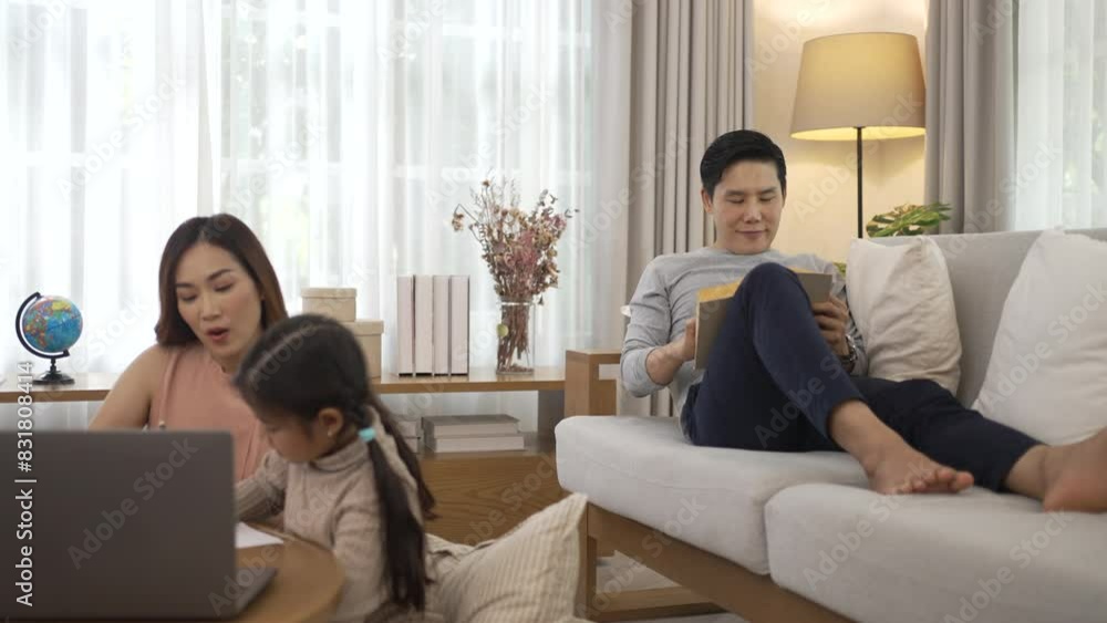Parents and daughter studying via internet at home. Parents and daughter studying via internet at home.