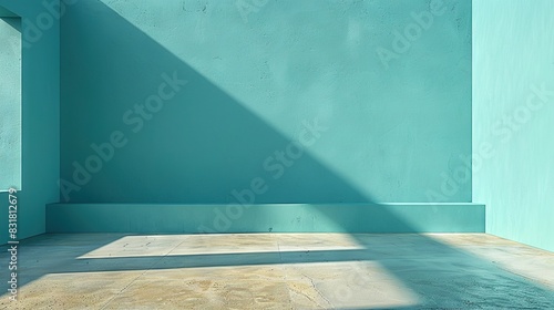   An unadorned chamber featuring a azure-hued wall surface and a seat positioned centrally, with a projected shadow on the wall photo