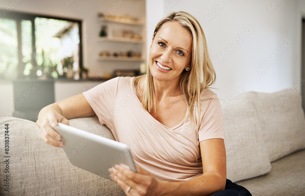 Woman, portrait and tablet on sofa for social media, scroll and news report online on couch. Technology, internet and search on digital website in home, mature person or lounge for relax and network Woman, portrait and tablet on sofa for social media, scroll and news report online on couch. Technology, internet and search on digital website in home, mature person or lounge for relax and network