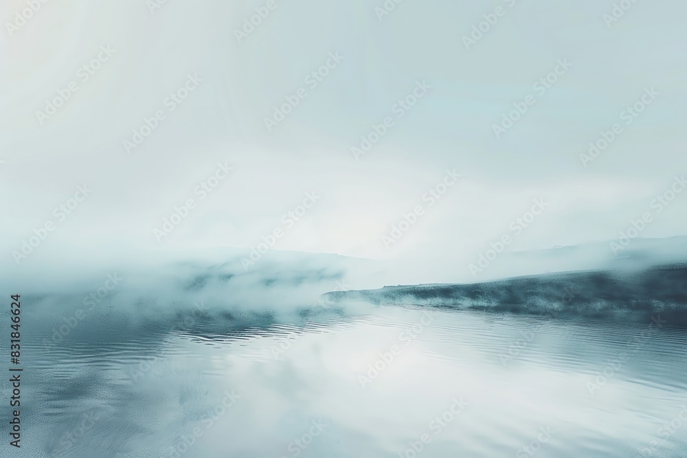 Calm, misty landscape with serene waters reflecting a cloudy sky, evoking tranquility and peacefulness. Ideal for backgrounds and contemplative themes.