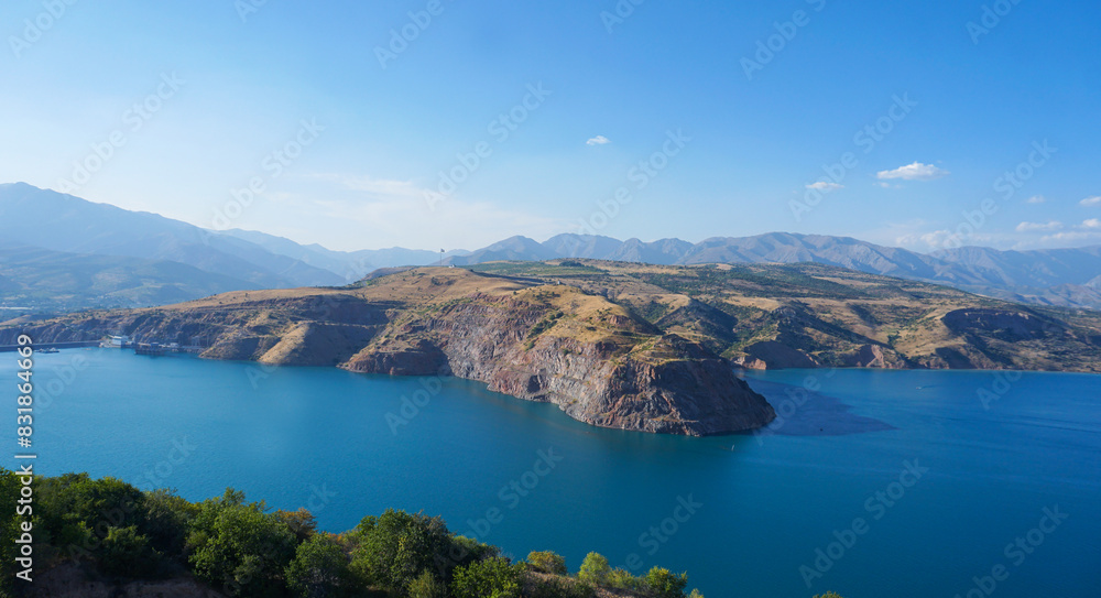 Fototapeta premium A large reservoir between the mountains