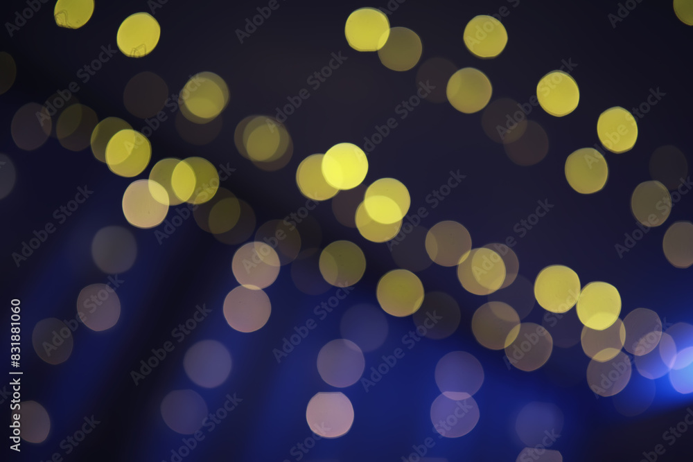 Abstract bokeh background. Golden bokeh circles on dark blue background. Layer overlay. Abstract bokeh background. Golden bokeh circles on dark blue background. Layer overlay.