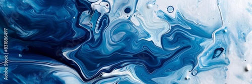 abstraction of blue and white liquid paints in slow blending flow mixing gently