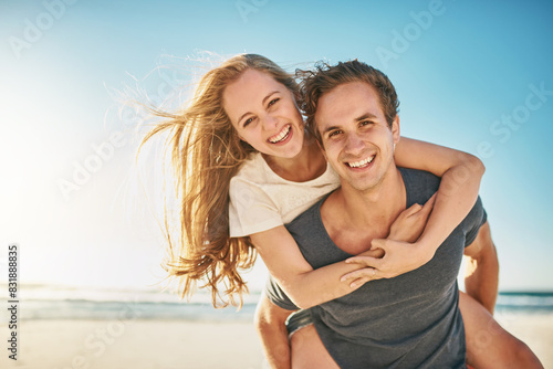 Fotografi Portrait, piggy back and seaside with couple, love and sunshine with happiness, adventure and romance