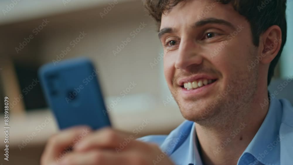 Cheerful employee browsing banking app cellphone satisfied in office close up. Cheerful employee browsing banking app cellphone satisfied in office close up.