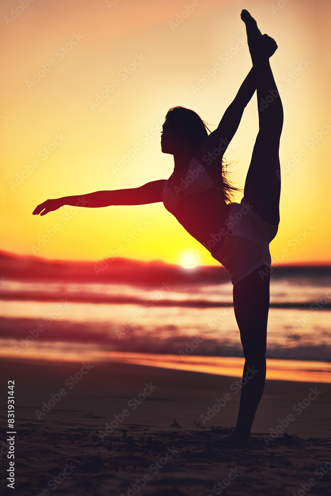 Woman, sunset and dancing silhouette on beach, contemporary ballet and peace in nature with dancer. Wellness, freedom and vitality on summer vacation, stretching and seashore water with horizon