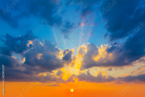 dramatic sunset over a cloudy sky  evening sunset background